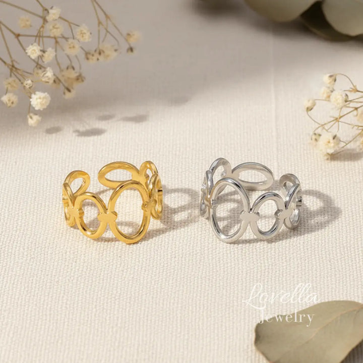 Gold and silver rings on a textured surface with 'Lujalia Jewelry' branding.