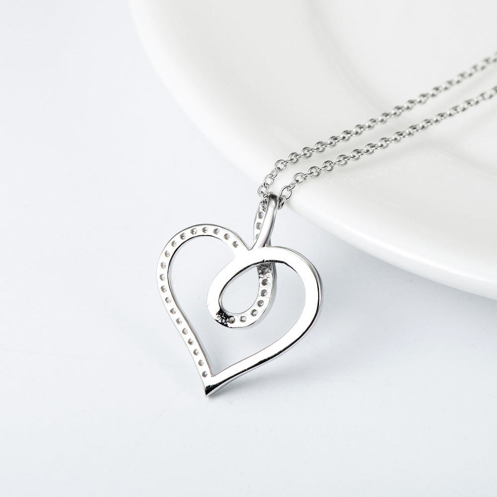 Collar con colgante de corazón e infinito en plata de ley