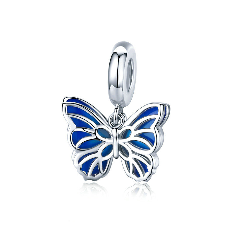 Charm de plata de ley 925 con esmalte de mariposa y tono azul