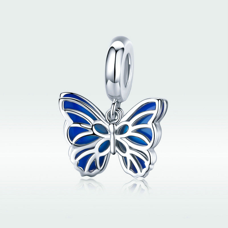 Charm de plata de ley 925 con esmalte de mariposa y tono azul