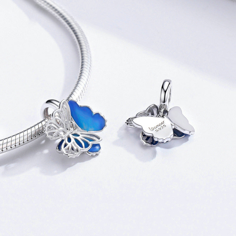 Charm de plata de ley 925 con esmalte de mariposa y tono azul