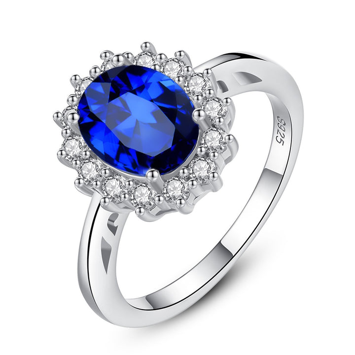 Sterling Silver Ring with Blue Sapphire Crystal and Halo Design