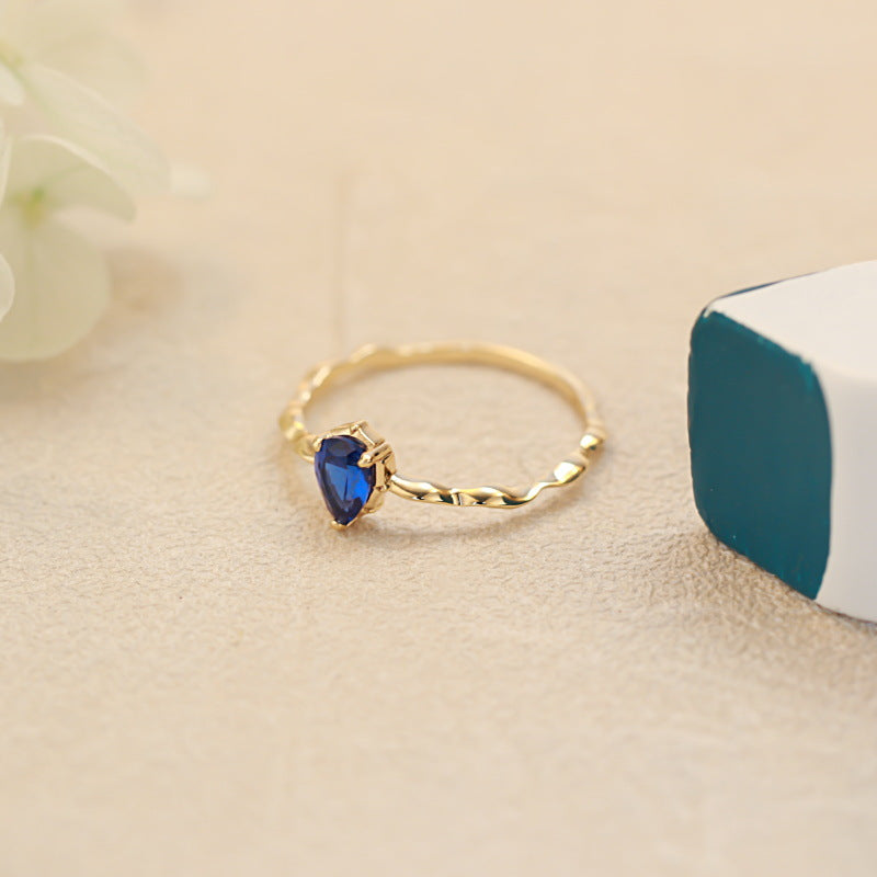 Twisted Gold Band Ring with Sapphire Crystal