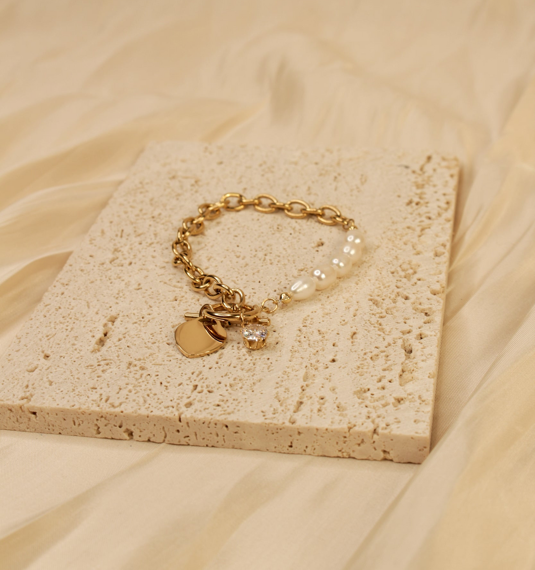 Elegant Gold and Pearl Heart Charm Bracelet