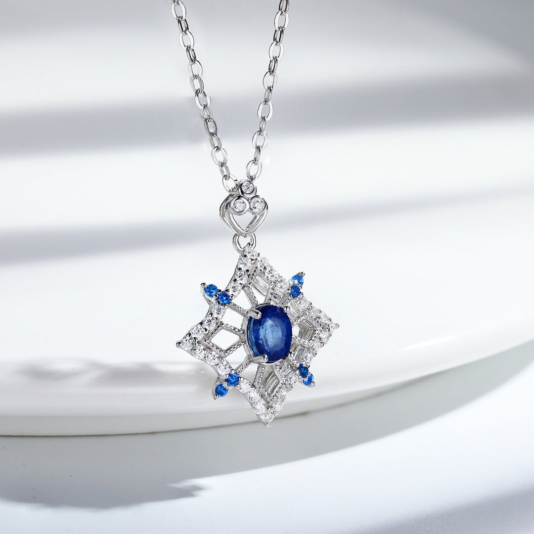 Ice Queen Elegance: Blue Sapphire Snowflake Necklace with Crystal Embellishments