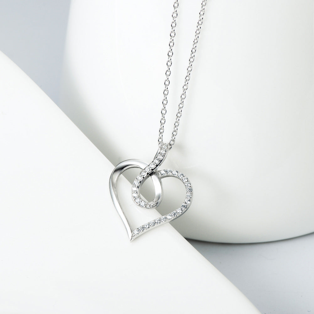 Collar con colgante de corazón e infinito en plata de ley