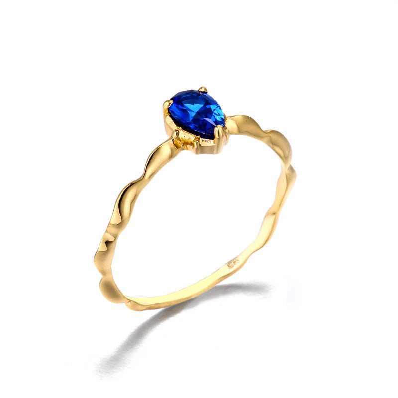 Twisted Gold Band Ring with Sapphire Crystal