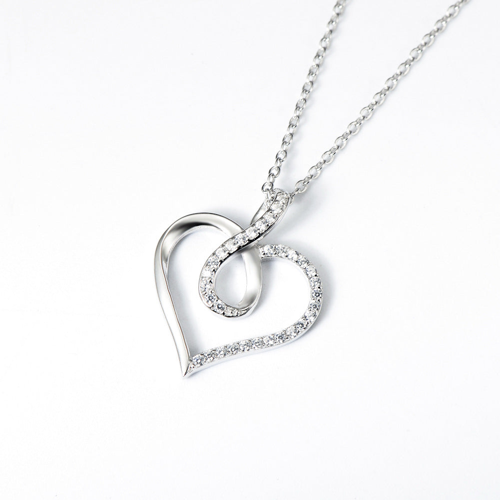 Collar con colgante de corazón e infinito en plata de ley