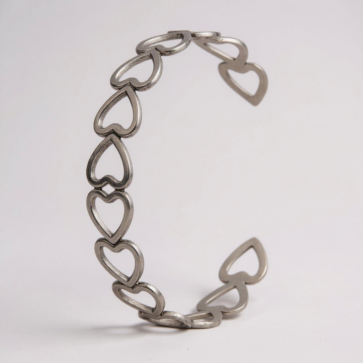 Pulsera de eslabones de corazón abierto dorado