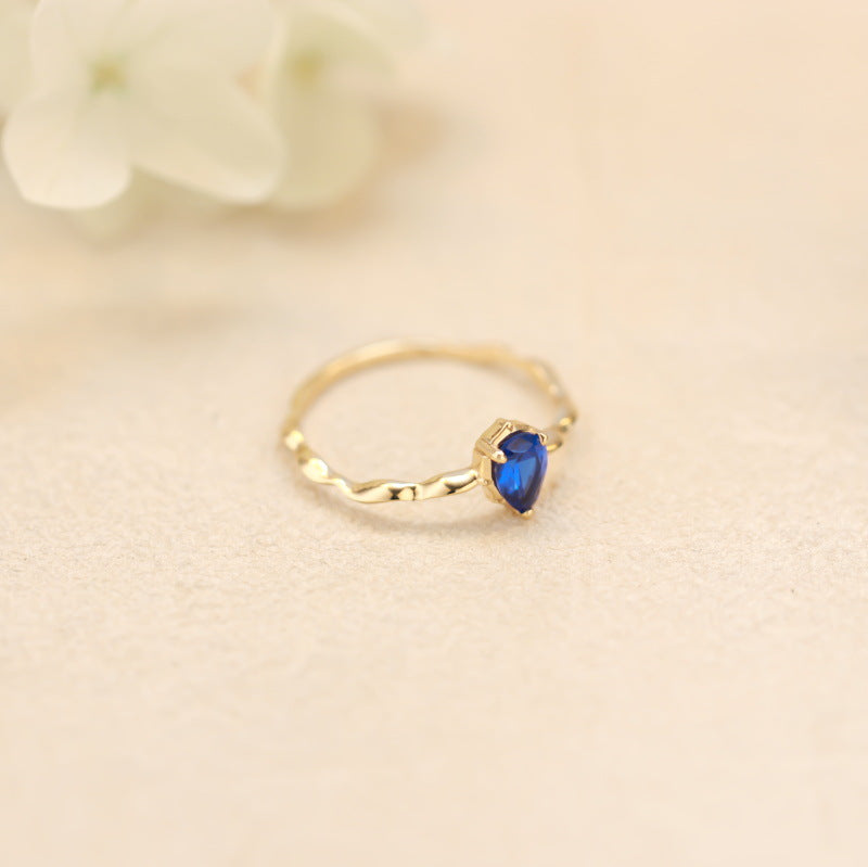 Twisted Gold Band Ring with Sapphire Crystal