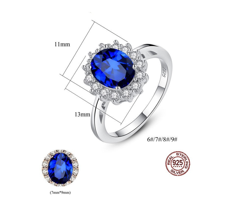 Sterling Silver Ring with Blue Sapphire Crystal and Halo Design