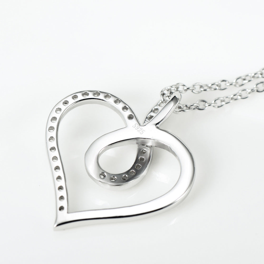 Collar con colgante de corazón e infinito en plata de ley