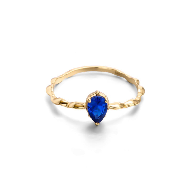 Twisted Gold Band Ring with Sapphire Crystal