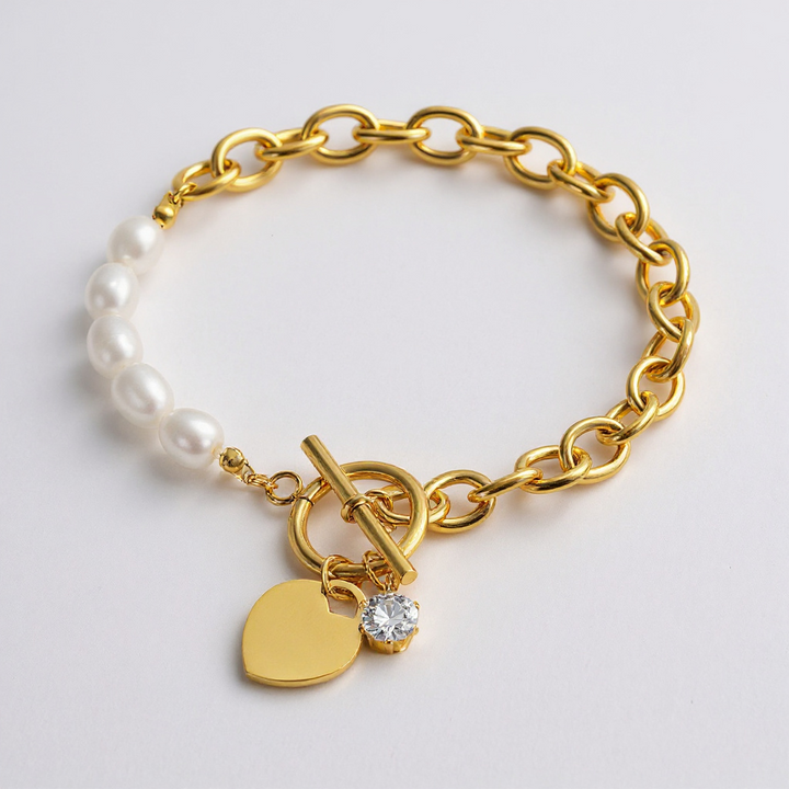 Elegant Gold and Pearl Heart Charm Bracelet