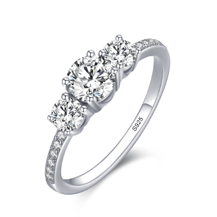 Triple Radiance: Sterling Silver Ring with Trio of Crystal Accents