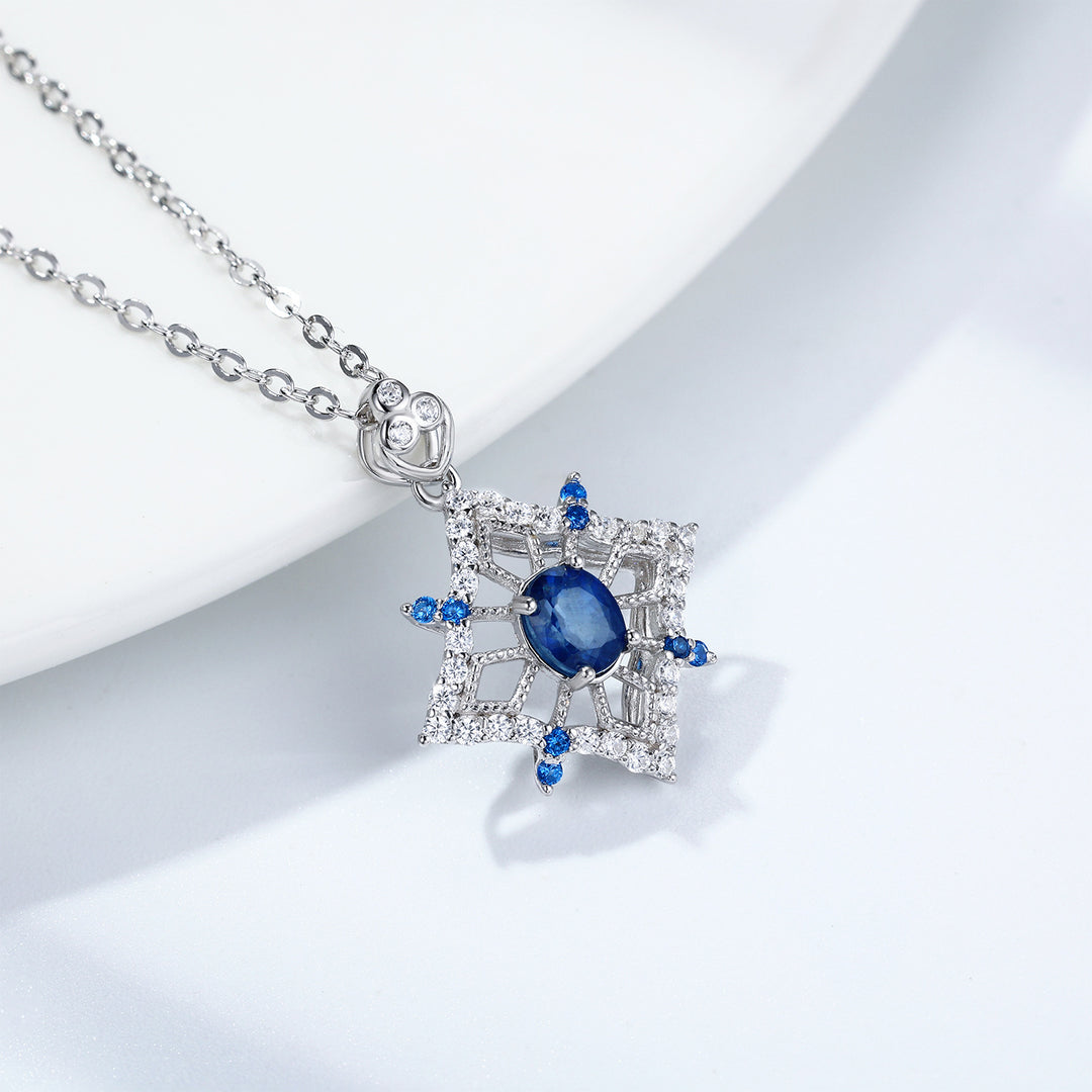 Ice Queen Elegance: Blue Sapphire Snowflake Necklace with Crystal Embellishments