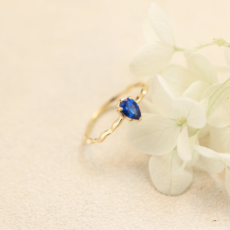 Twisted Gold Band Ring with Sapphire Crystal