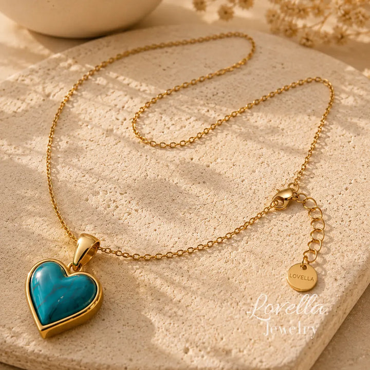 Amore Turquoise Heart Necklace laid flat showing gold-plated chain, clasp, extender and pendant