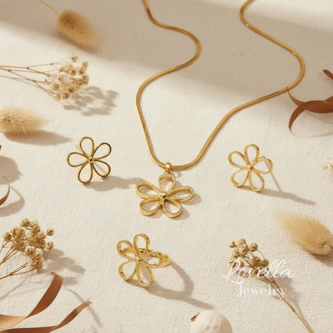 Gold floral jewelry set on a soft beige background with 'Lavella Jewelry' branding.