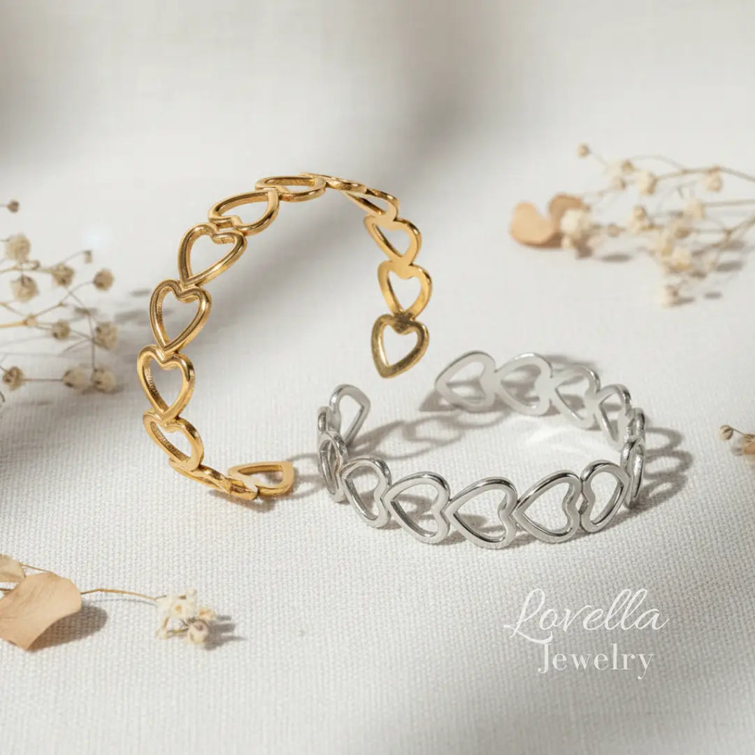Gold and silver chain bracelets on a light background with 'Lovella Jewelry' branding.