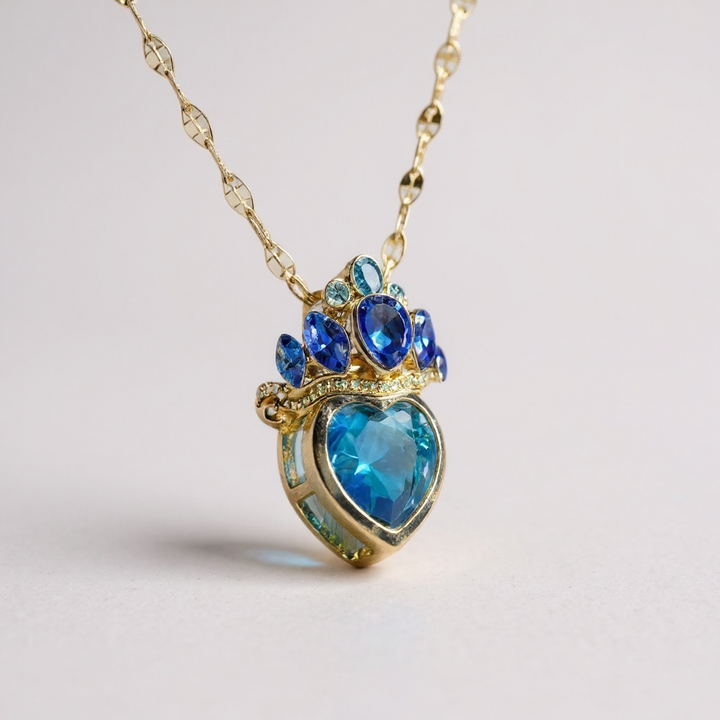 Collar con corona de piedras preciosas azules: acero inoxidable en tono dorado