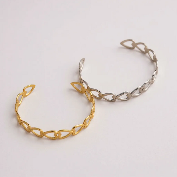 Pulsera de eslabones de corazón abierto dorado