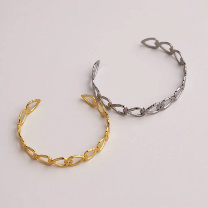 Pulsera de eslabones de corazón abierto dorado