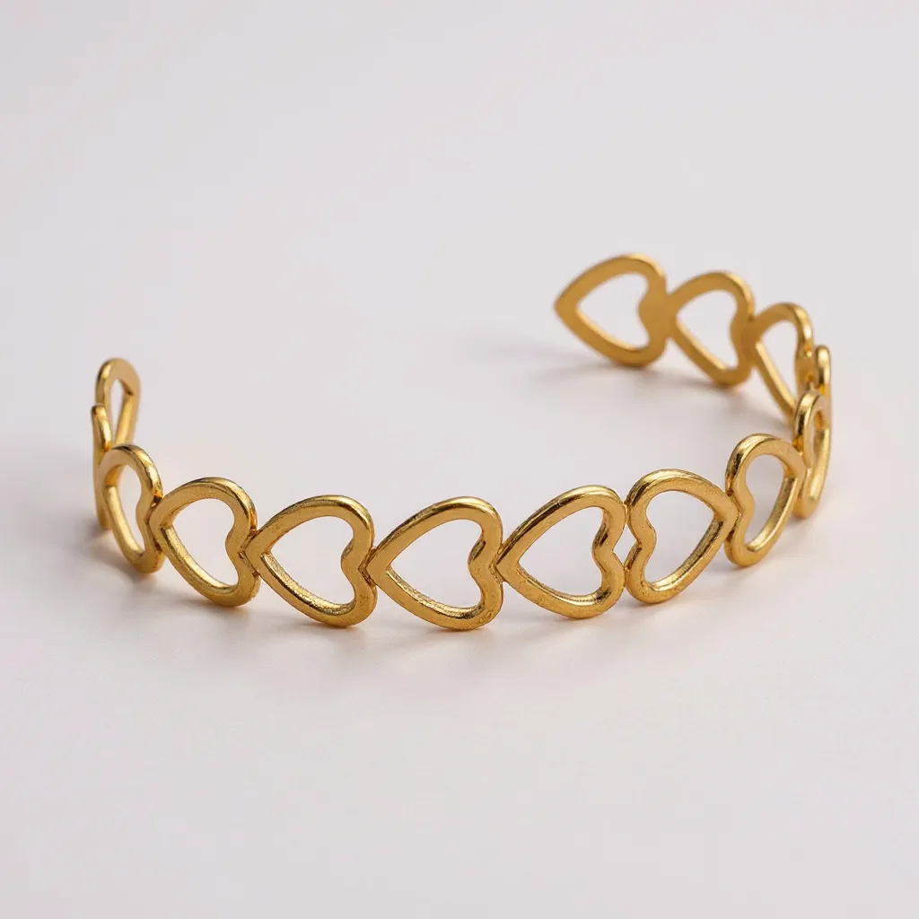 Pulsera de eslabones de corazón abierto dorado