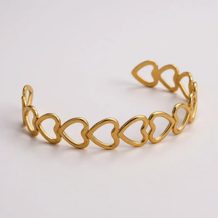 Pulsera de eslabones de corazón abierto dorado