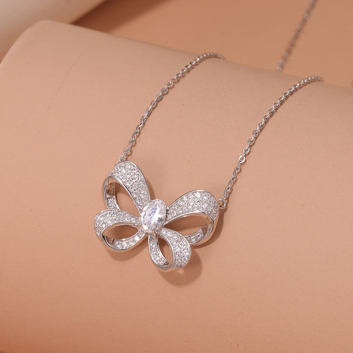 Sterling Silver Bow Pendant with Pavé Setting