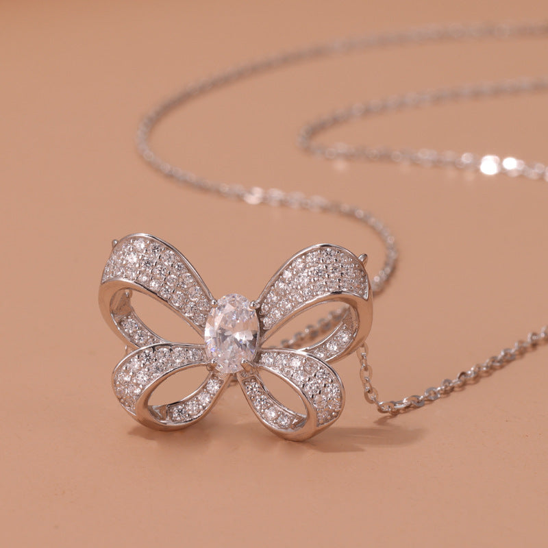 Sterling Silver Bow Pendant with Pavé Setting