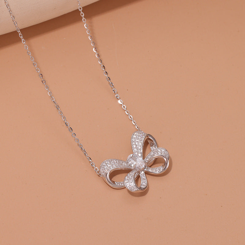 Sterling Silver Bow Pendant with Pavé Setting