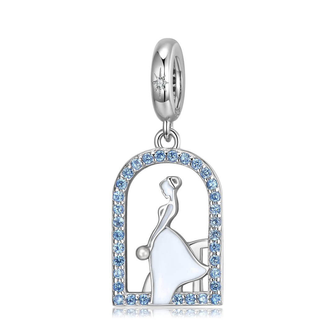 Charm en forma de arco de bailarina de plata de ley con cristales azules